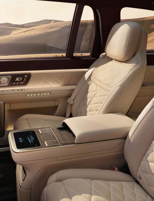 The interior of a NIO ES9 featuring premium cream-colored quilted leather seating