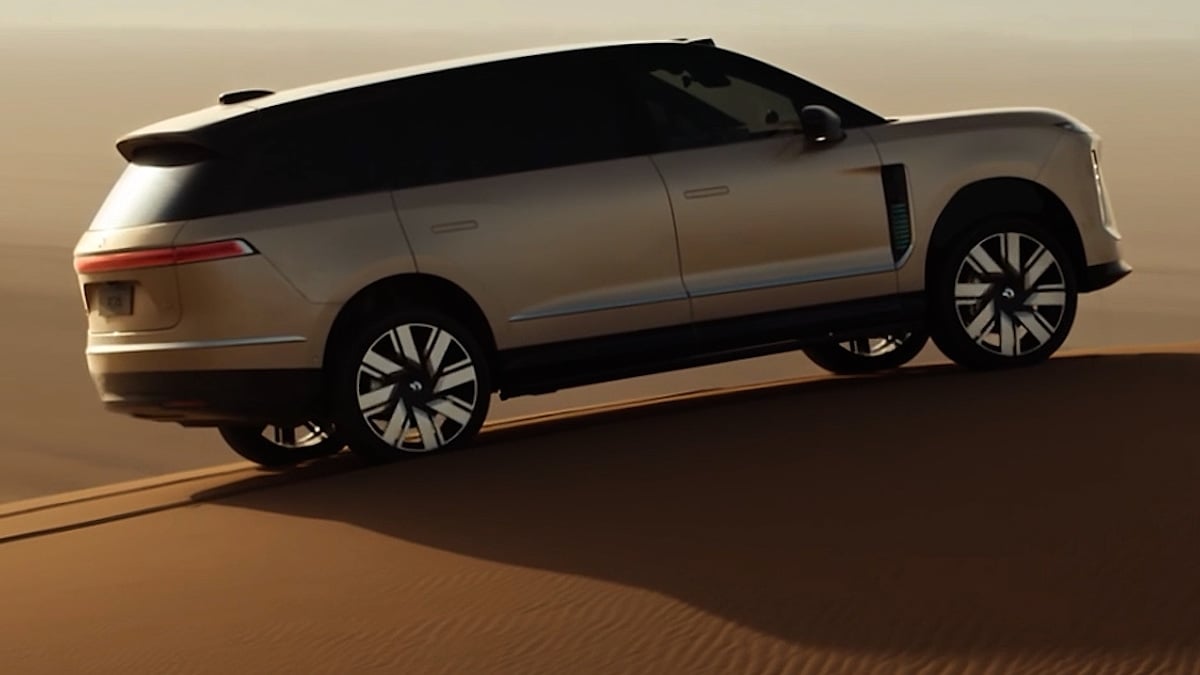 Flagship NIO ES8 SUV on sand dune