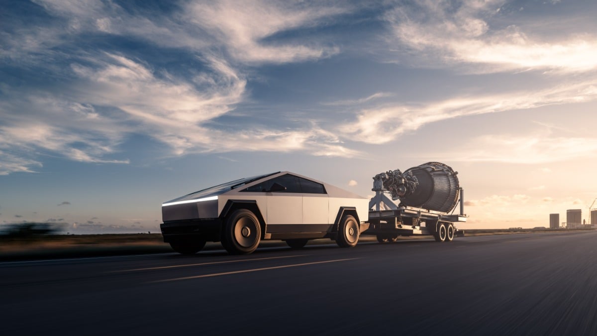 Tesla Cybertruck concept towing SpaceX rocket components at sunset, shown in side profile with stainless steel angular body against dramatic sky.