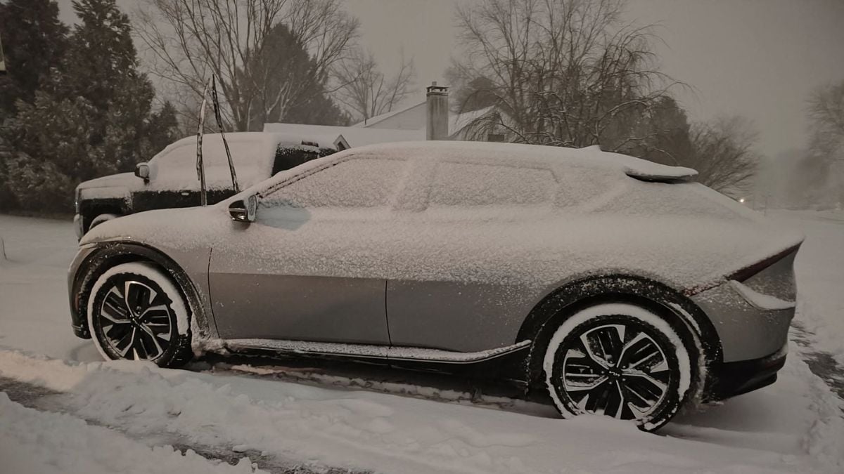 Kia EV6 covered in snow