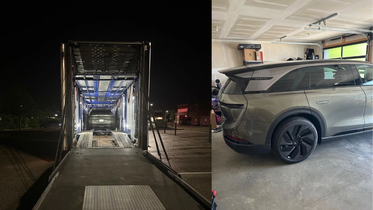 Electric SUV inside car transporter at night, side view in garage