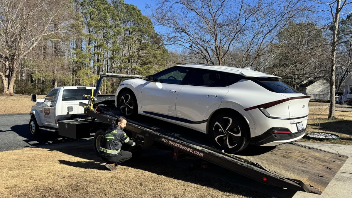 Pamela's Kia EV6 being towed by a tow track