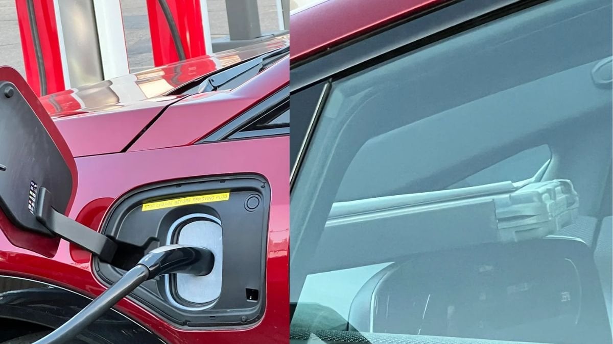 A red Cadillac Optiq EV is charging at a station, with the charging port visible alongside a work tool in the car's interior.