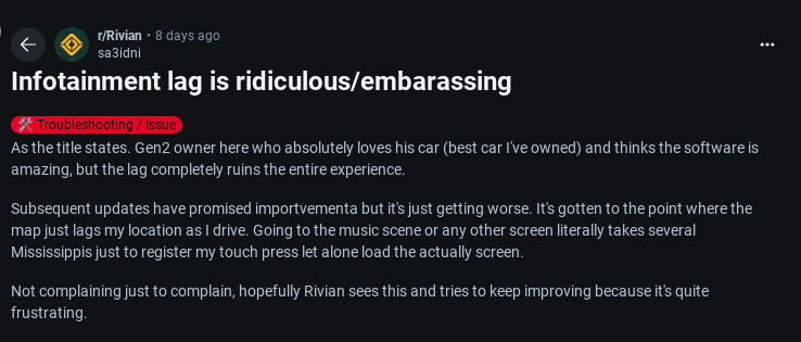 A Reddit post discussing infotaiment lag issues in a Rivian vehicle, expressing frustration with software performance and user experience.