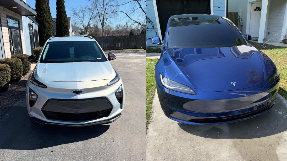 A side-by-side view of a silver Chevrolet Bolt EUV and a blue Tesla Model 3 parked outside a house on a sunny day.