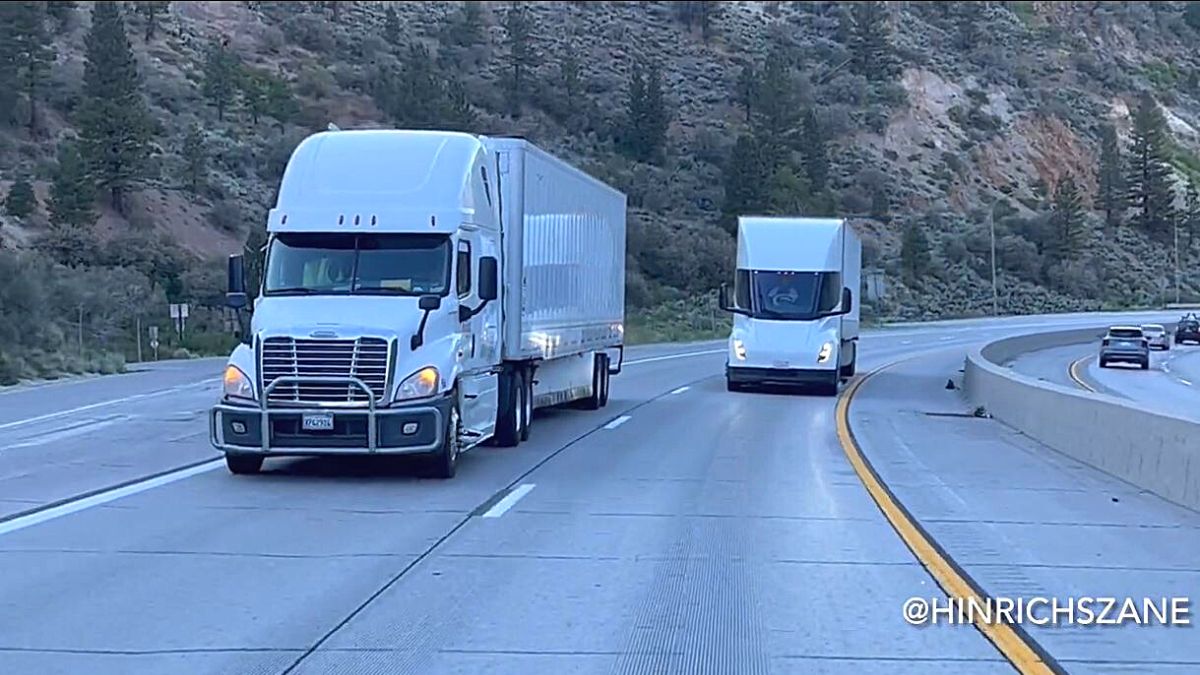 Tesla Semi passing a diesel semi truck