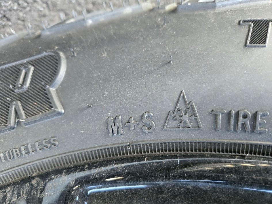 Three-peak mountain snowflake symbol on Goodyear Territory RT tires