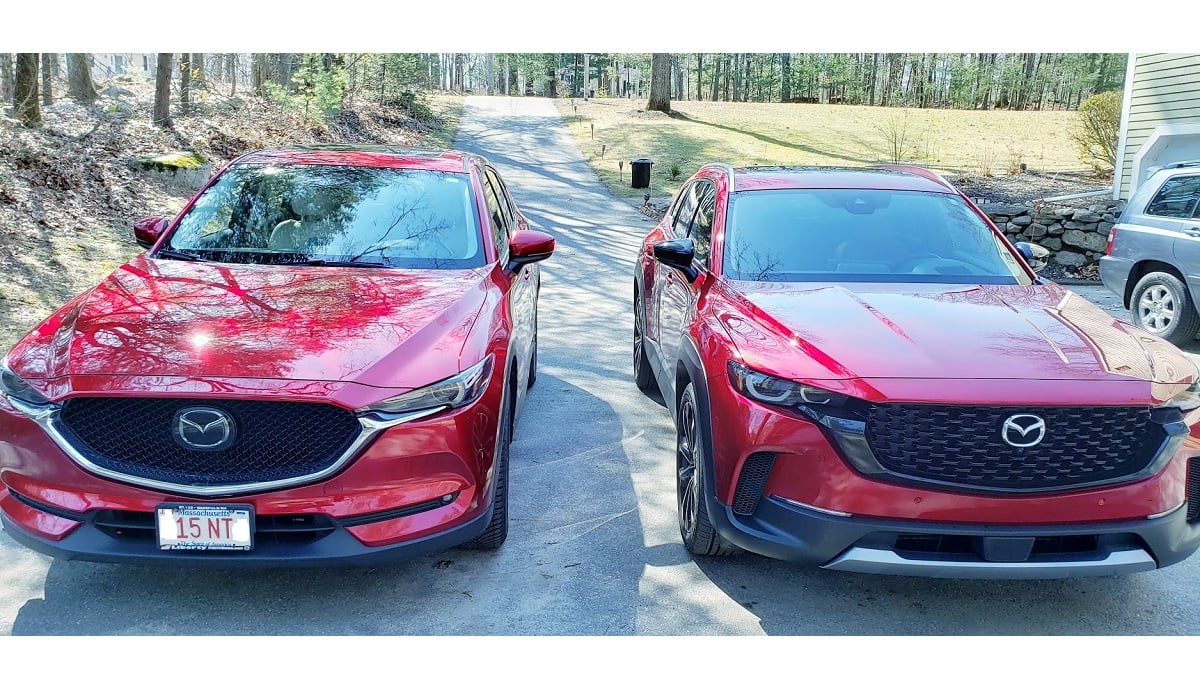 Image of Mazda red cars by John Goreham