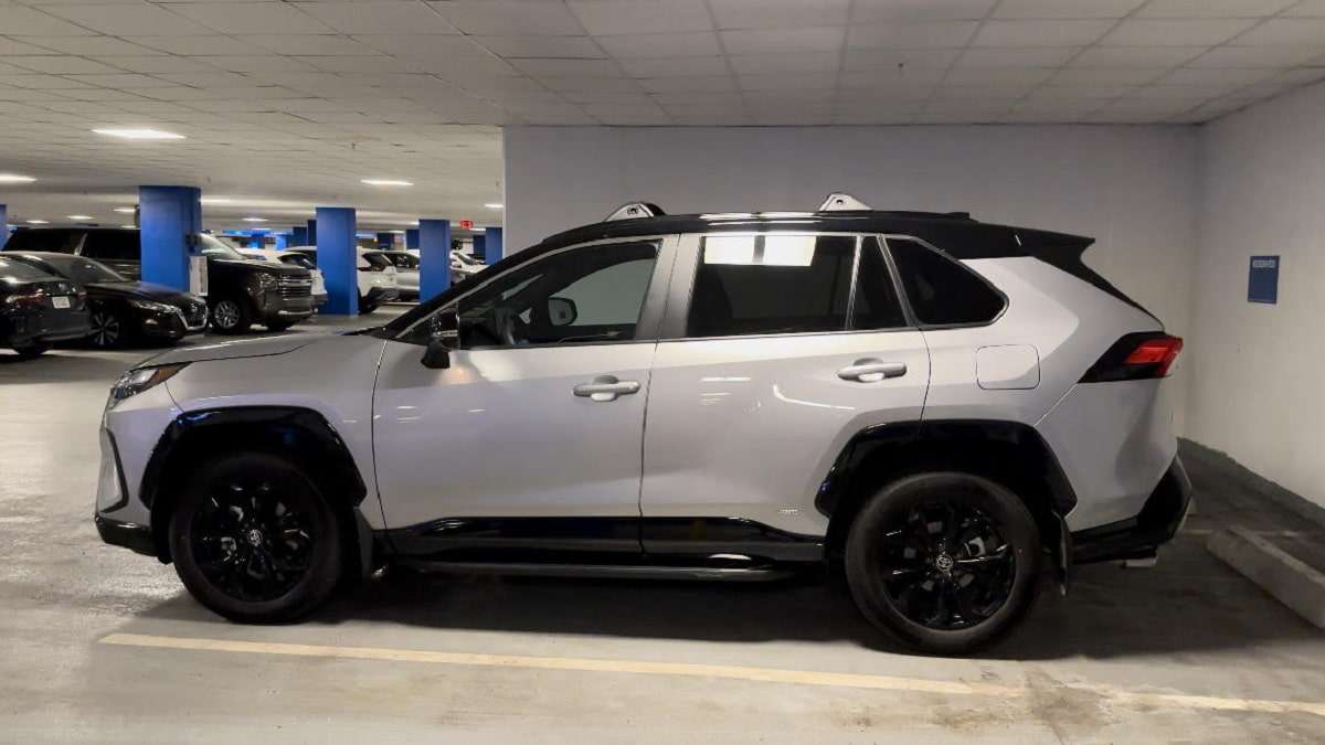 2023 Toyota RAV4 Hybrid XSE Silver Sky Metallic profile view