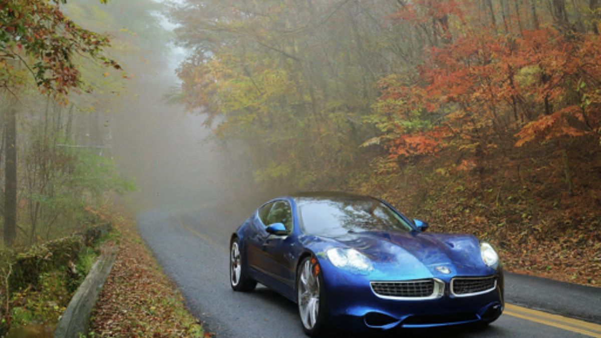 Fisker Karma Driving through the forest