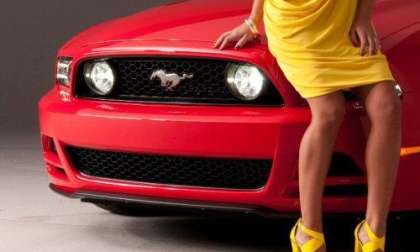 Dalena Henriques leaning against the 2013 Ford Mustang GT