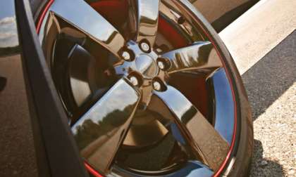 The wheel of the 2013 Dodge Challenger R/T Redline