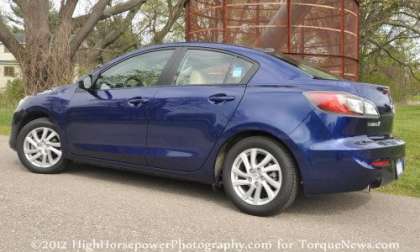 The 2012 Mazda 3i Grand Touring sedan side profile