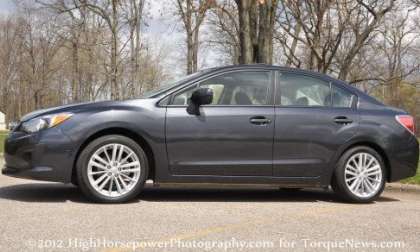 The side profile of the 2012 Subaru Impreza 20.i Premium sedan