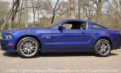 The 2013 Ford Mustang GT Premium Coupe from the side