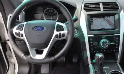 The dash and steering wheel of the 2011 Ford Explorer