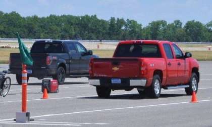 A 2013 Ford F150 racing a 2013 Chevy Silverado