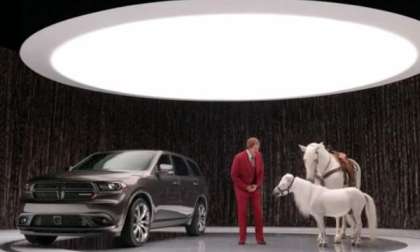 Ron Burgundy with the Dodge Durango and 2 horses