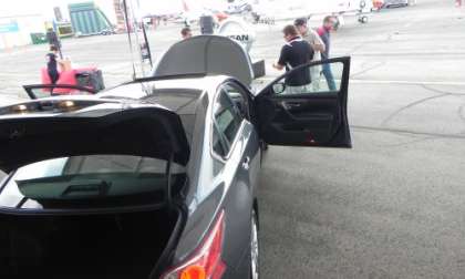 2013 Altima amidst the aircraft at the Rocky Mountain Air Show