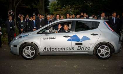 Japanese Prime Minister Shinzo Abe in Autonomous Drive Nissan LEAF