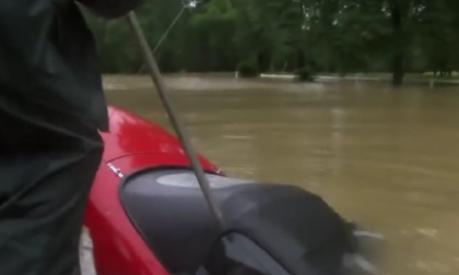 Convertible top saves woman in Mazda Miata