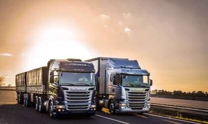 Scania trucks on the road.