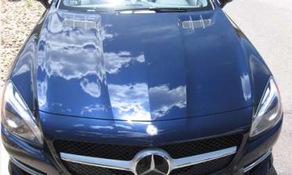 Clouds reflected in the hood of the 2013 Mercedes-Benz SL 550c