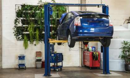 Luscious Garage 2007 Toyota Prius On Lift Getting Serviced
