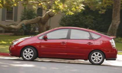2007 Toyota Prius Red Side Shot with Cat Security