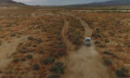 Ford Bronco driving in a desert