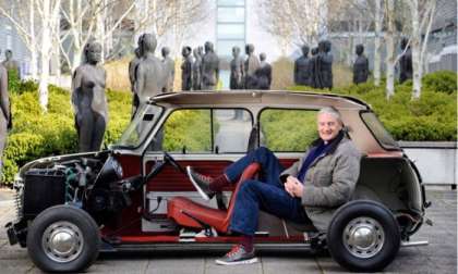 Dyson boss with Dyson electric car