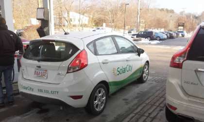 Image of Solar City vehicle at gas pump by John Goreham