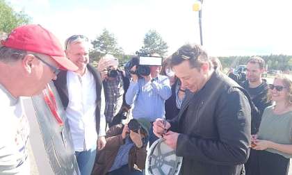 Tesla CEO Elon Musk chatting with Tesla suporters at Giga Berlin car factory