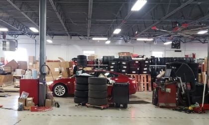 Image of Tesla service area with tires by John Goreham