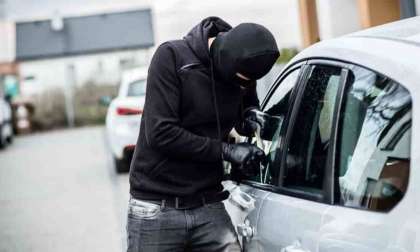 Car Thief Tries To Break Into Window