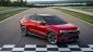 A red Chevy Blazer EV on test track