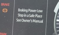 Third-generation Toyota Sequoia warning message for brake failure and potential causes Third-generation Toyota Sequoia driver instrument cluster